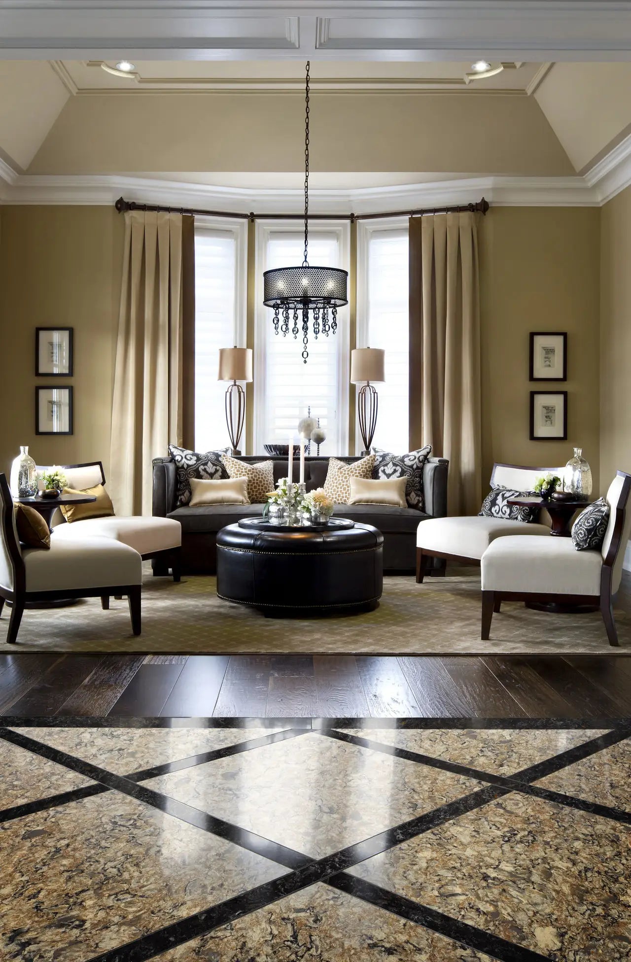 Granite flooring with diamond pattern inlay in elegant living room — luxurious stone countertops installed by Signature Stone Las Vegas
