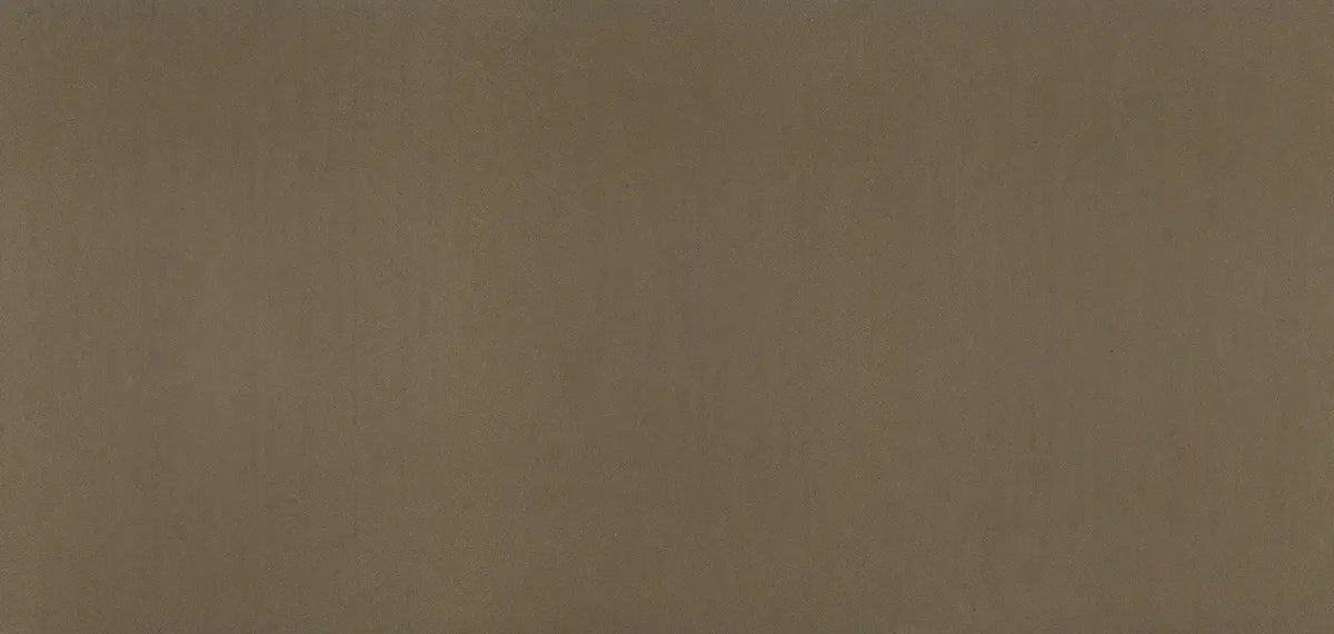Brighstone quartz surface with warm taupe finish and subtle texture — custom countertops fabricated and installed by Signature Stone LV