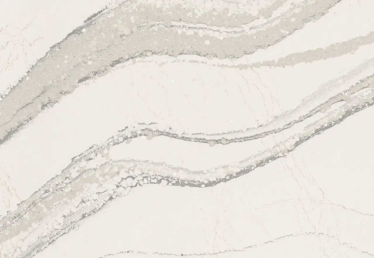 Brittanicca marble surface with flowing white and gray veining patterns — custom countertops fabricated and installed by Signature Stone LV