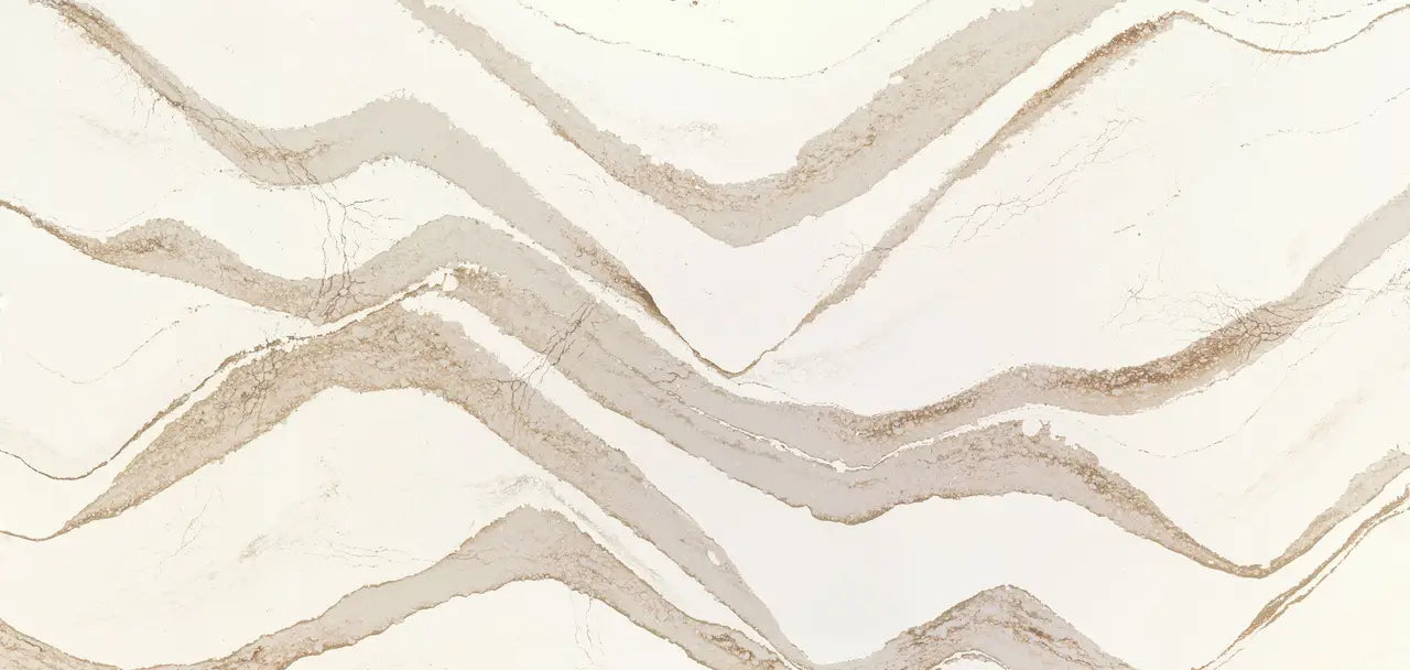 Brittanicca Gold Cool marble slab featuring flowing beige and cream veining patterns — premium stone countertops installed by Signature Stone Las Vegas