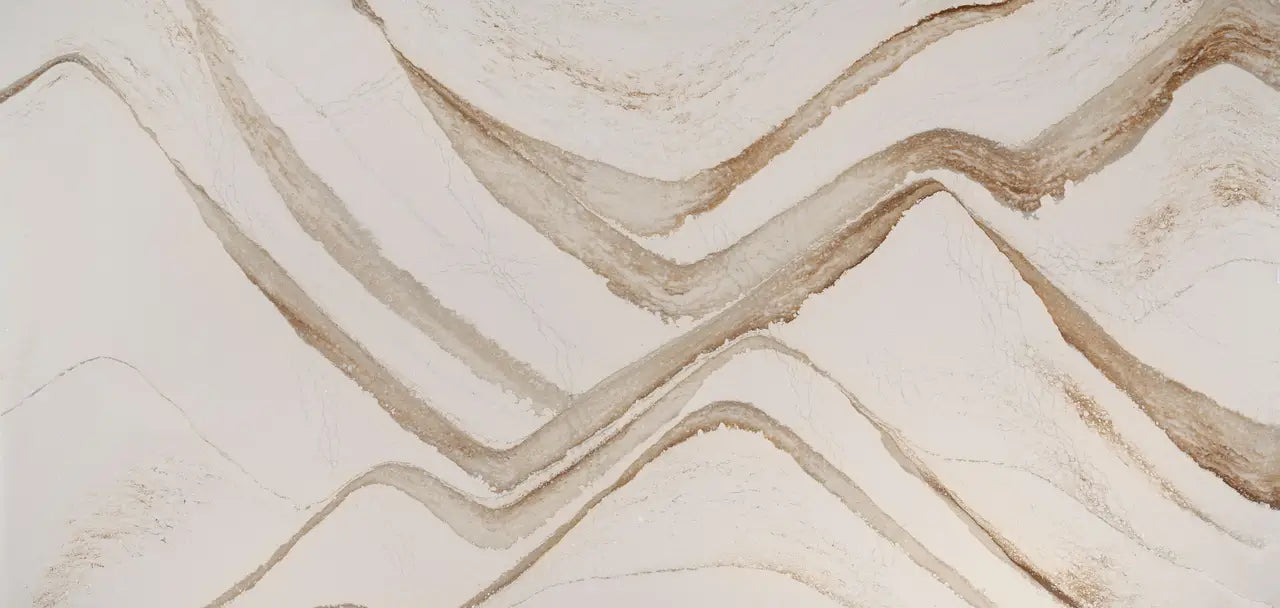 Brittanicca Gold Warm quartz surface with flowing golden veining and polished finish — custom countertops fabricated and installed by Signature Stone LV