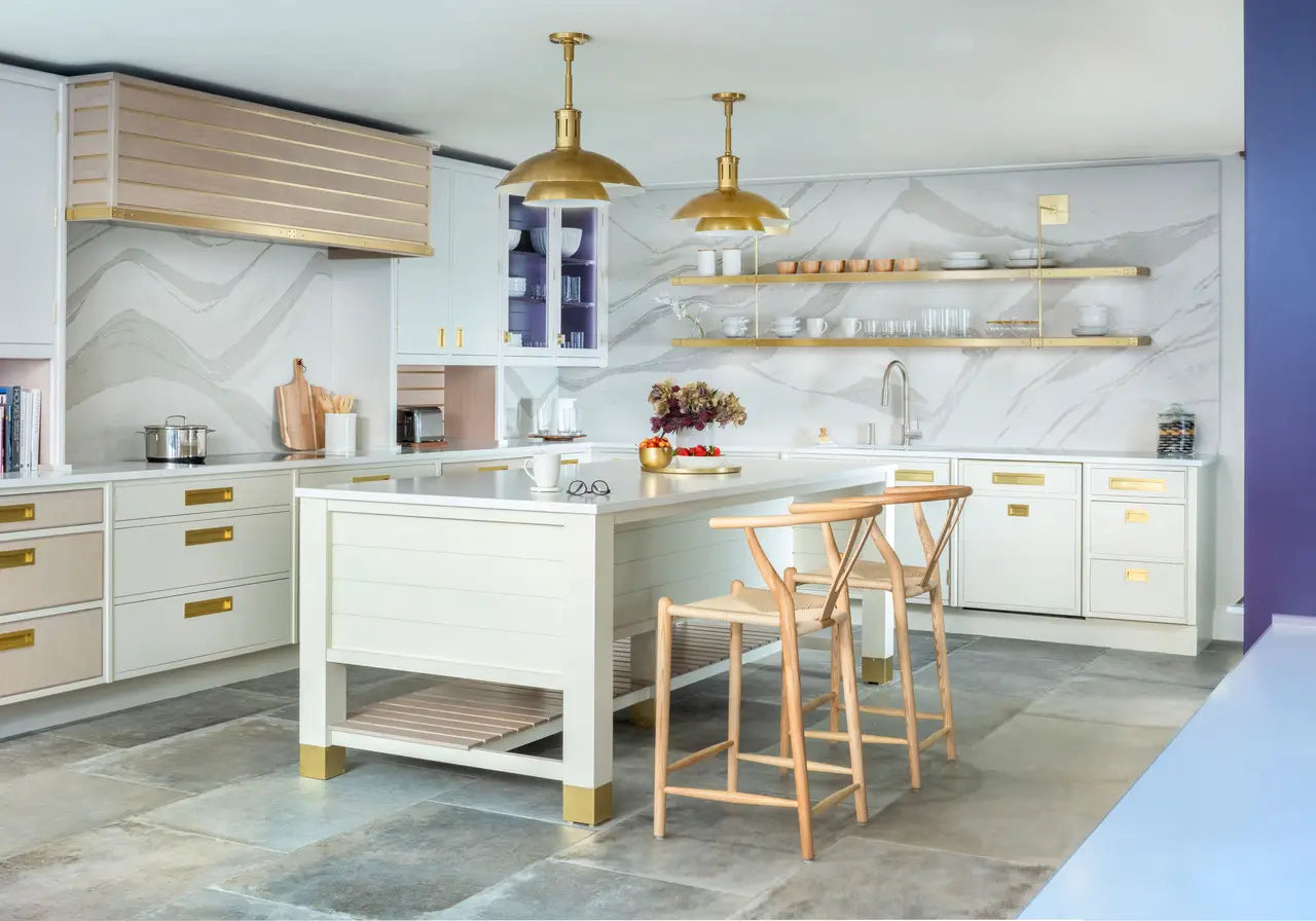 Brittanicca Warm quartz kitchen island and perimeter countertops with white veining and polished finish — expert countertop fabrication by Signature Stone La...
