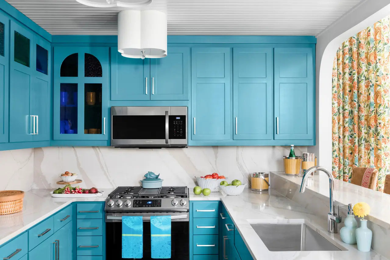 Brittanicca Warm quartz kitchen countertops with white veining and polished finish — premium stone countertops installed by Signature Stone Las Vegas