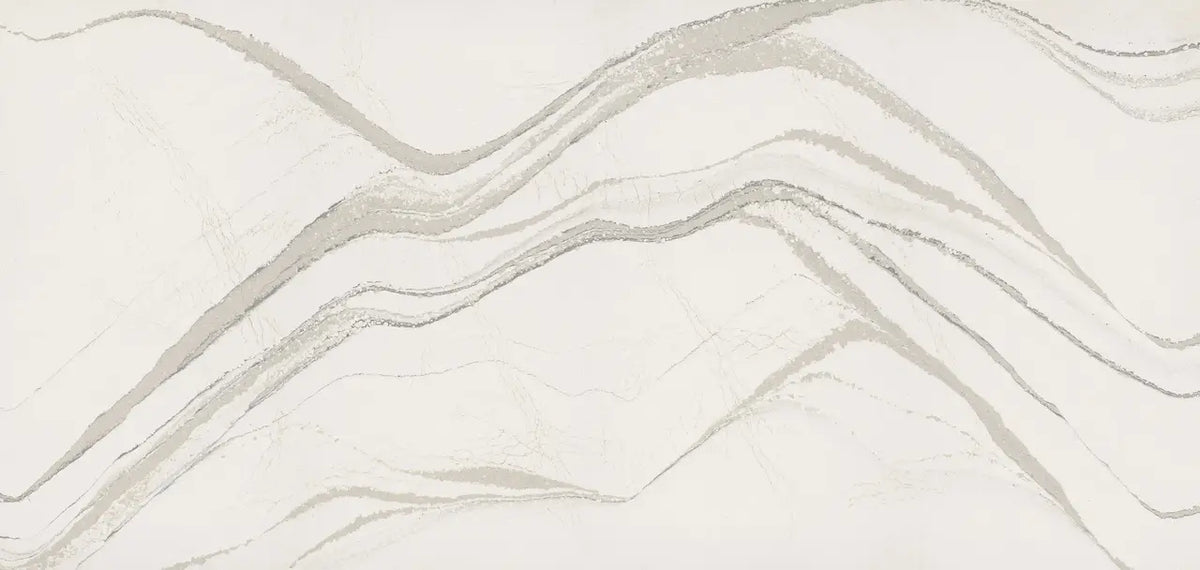 Brittanicca quartz slab with flowing white and gray veining and polished finish — elegant stone countertops installed by Signature Stone Las Vegas