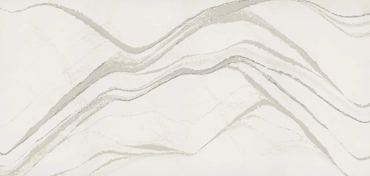 Brittanicca quartz slab with flowing white and gray veining and polished finish — elegant stone countertops installed by Signature Stone Las Vegas
