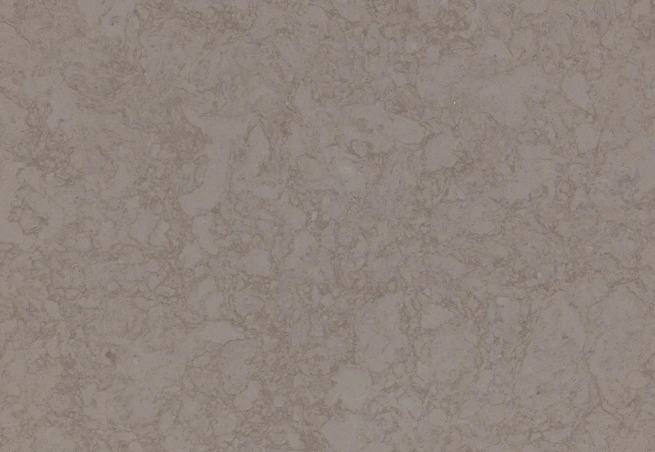 Brookvale quartz surface featuring warm taupe tones with subtle marbled veining and smooth matte finish — custom countertops fabricated and installed by Sign...