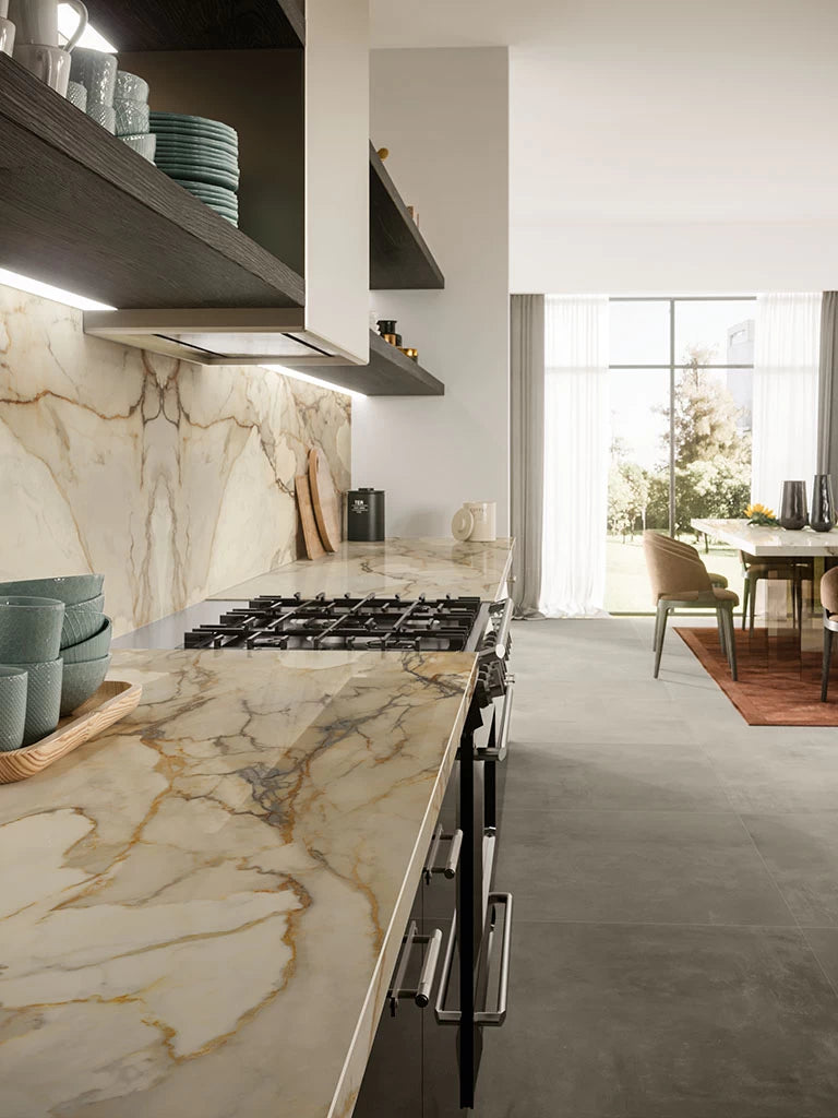 Calacatta Antique kitchen countertops with dramatic white and gold veining — premium stone countertops installed by Signature Stone Las Vegas