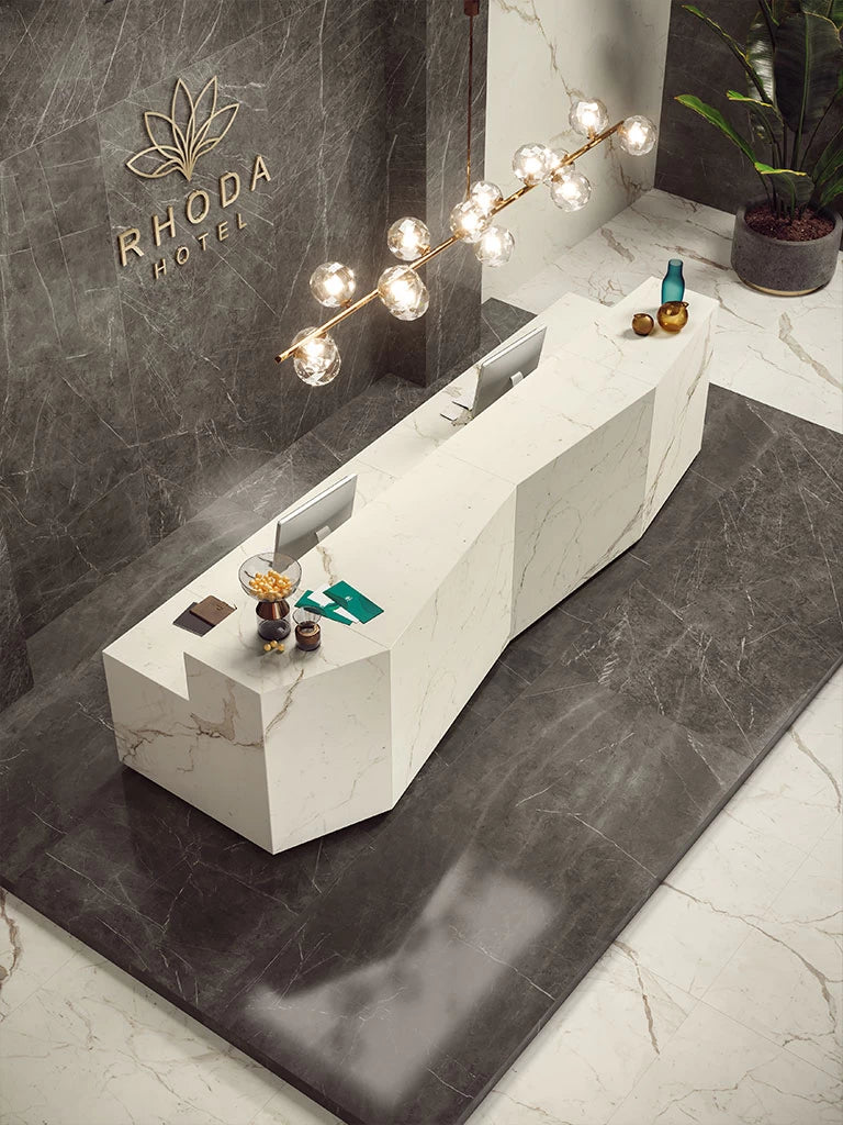 Calacatta Prestigio marble reception desk with white veining and polished finish — luxury stone countertops installed by Signature Stone Las Vegas