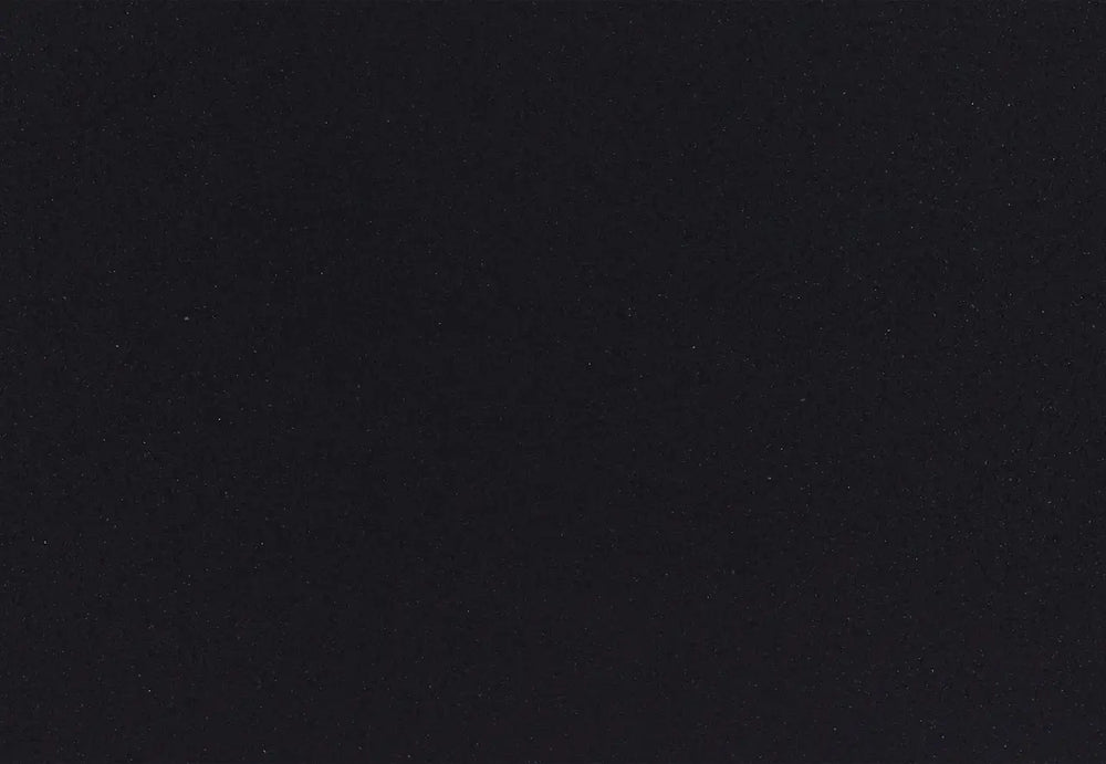 Cambria Black quartz kitchen countertop with dark speckled pattern and polished finish — white quartz countertops fabricated and installed by Signature Stone LV