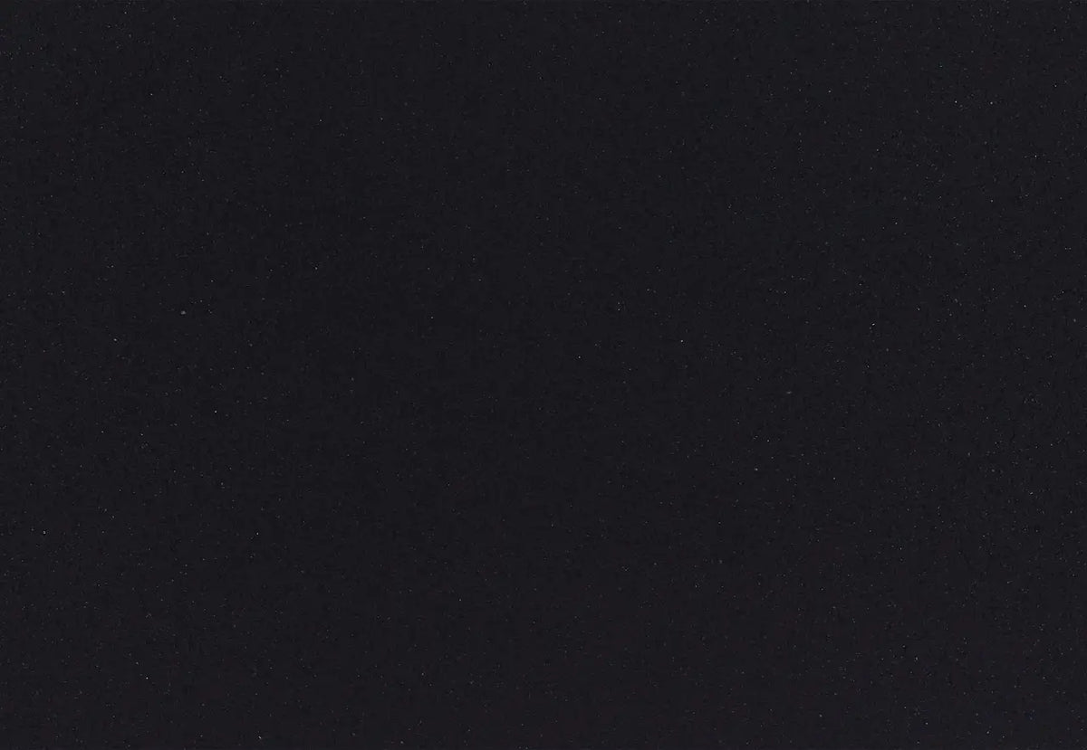 Cambria Black quartz kitchen countertop with dark speckled pattern and polished finish — white quartz countertops fabricated and installed by Signature Stone LV