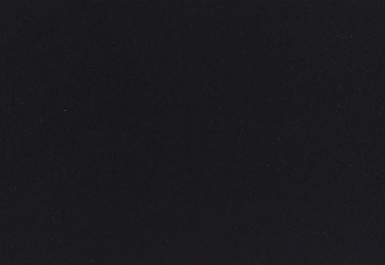 Cambria Black quartz kitchen countertop with dark speckled pattern and polished finish — white quartz countertops fabricated and installed by Signature Stone LV