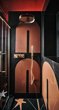Cambria Black quartz shower surround with sleek dark finish and curved architectural details — luxury quartz countertops installed by Signature Stone Las Vegas