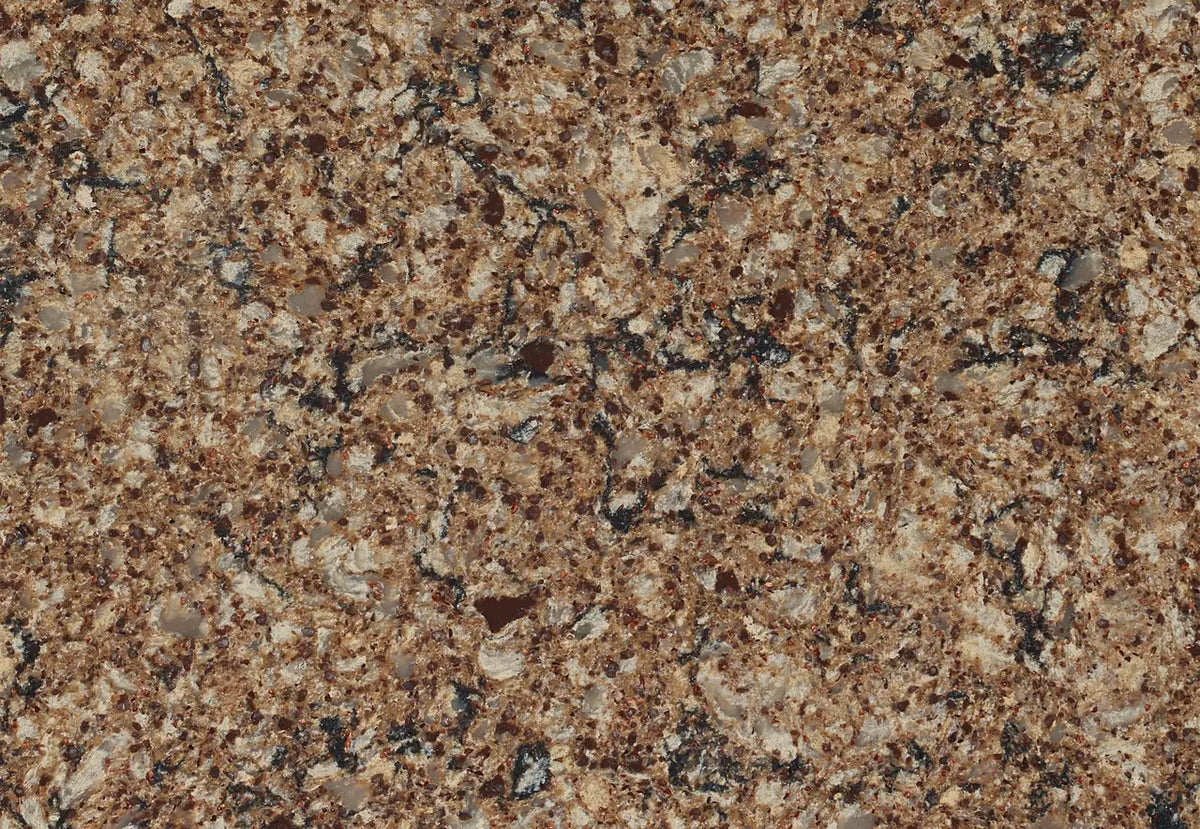 Canterbury quartz surface with warm brown and cream speckled pattern — custom countertops fabricated and installed by Signature Stone LV