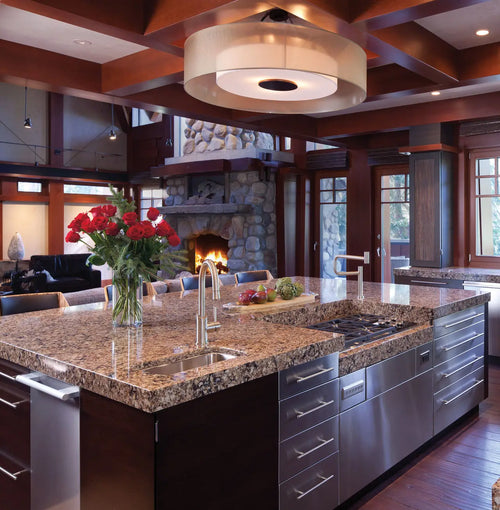 Granite kitchen island countertop with speckled brown pattern and polished finish — premium stone countertops installed by Signature Stone Las Vegas