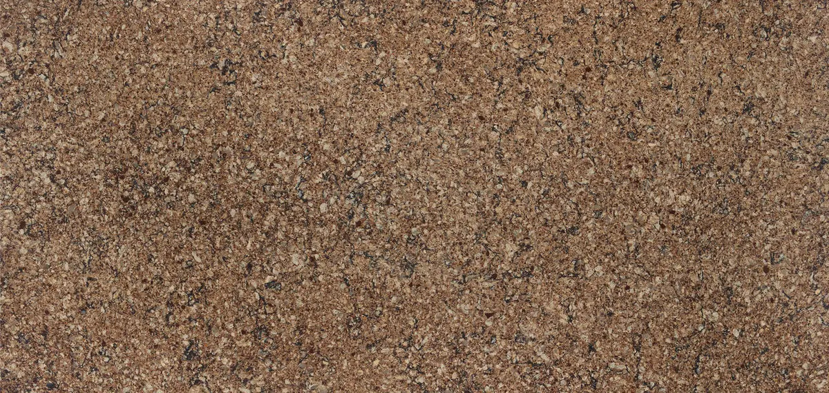 Canterbury quartz surface with warm brown tones and speckled granite-like finish — premium countertop fabrication by Signature Stone Las Vegas