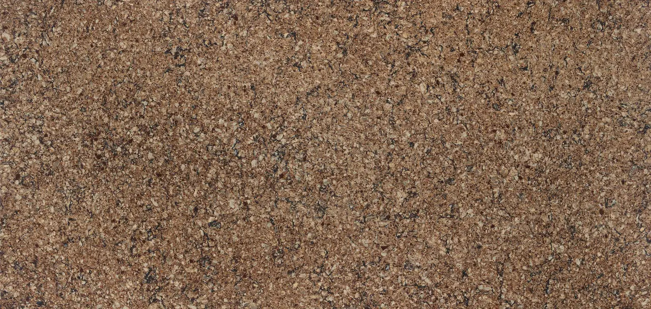 Canterbury quartz surface with warm brown tones and speckled granite-like finish — premium countertop fabrication by Signature Stone Las Vegas