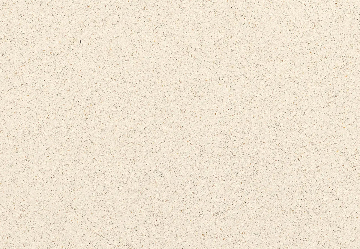 Cardiff Cream quartz surface with light beige background and subtle speckled pattern — custom countertops fabricated and installed by Signature Stone LV