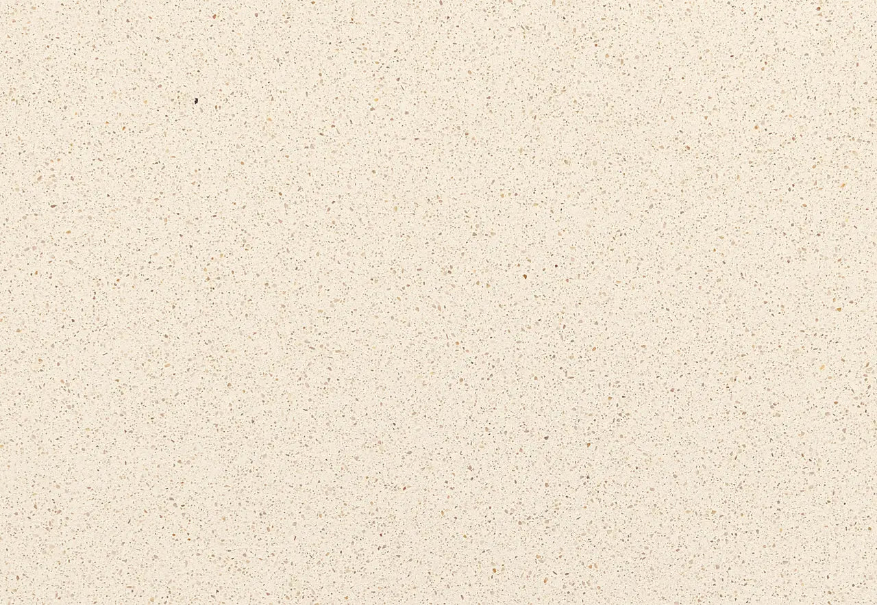 Cardiff Cream quartz surface with light beige background and subtle speckled pattern — custom countertops fabricated and installed by Signature Stone LV