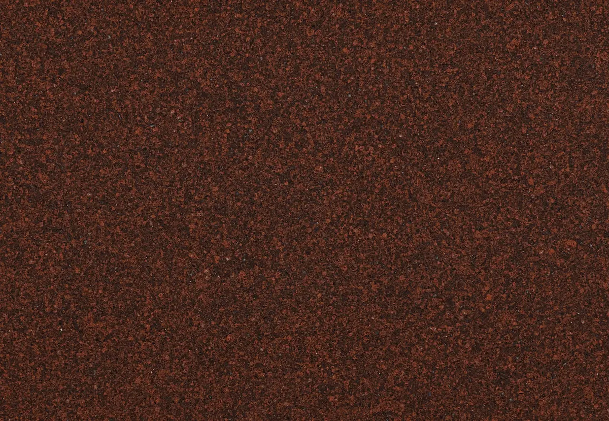 Carmarthen Brown granite surface with rich reddish-brown speckled pattern and polished finish — custom countertops fabricated and installed by Signature Ston...