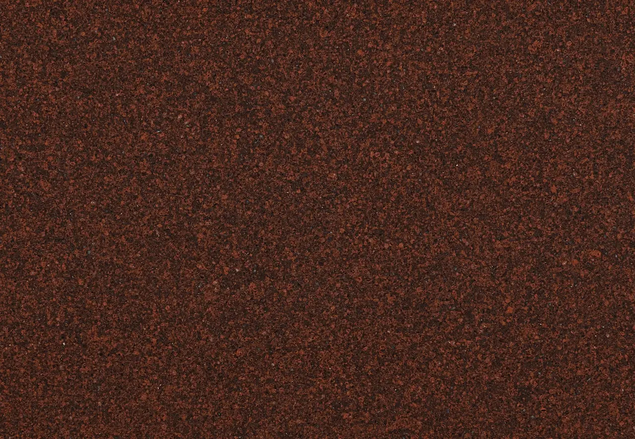 Carmarthen Brown granite surface with rich reddish-brown speckled pattern and polished finish — custom countertops fabricated and installed by Signature Ston...