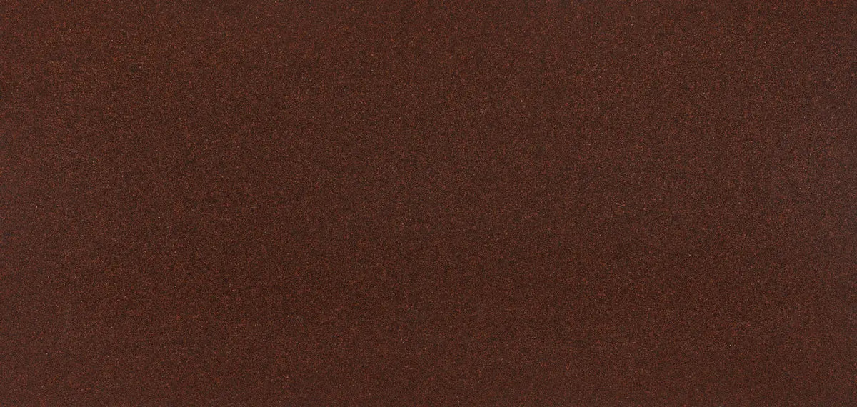 Carmarthen Brown quartz surface featuring rich chocolate brown color with subtle speckled texture — premium stone countertops installed by Signature Stone La...
