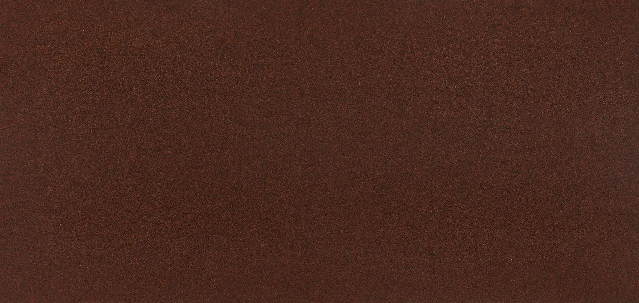 Carmarthen Brown quartz surface featuring rich chocolate brown color with subtle speckled texture — premium stone countertops installed by Signature Stone La...