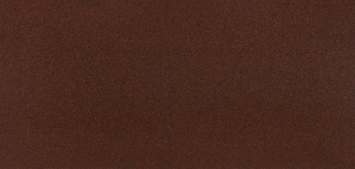 Carmarthen Brown quartz surface featuring rich chocolate brown color with subtle speckled texture — premium stone countertops installed by Signature Stone La...