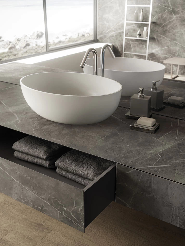 Grey marble vanity countertop with vessel sinks featuring veined pattern and polished finish — expert countertop fabrication by Signature Stone Las Vegas