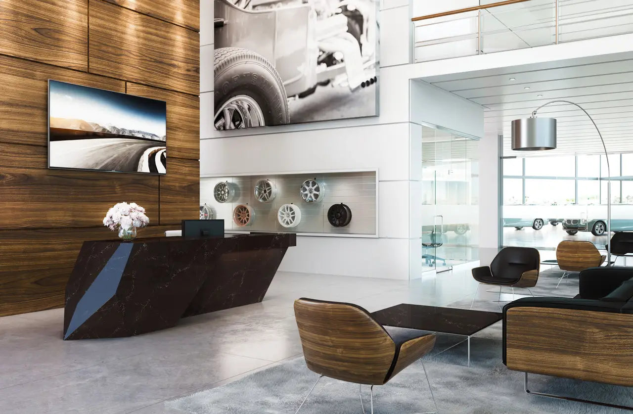 Dark marble reception desk with angular geometric design and polished finish — custom countertops fabricated and installed by Signature Stone LV