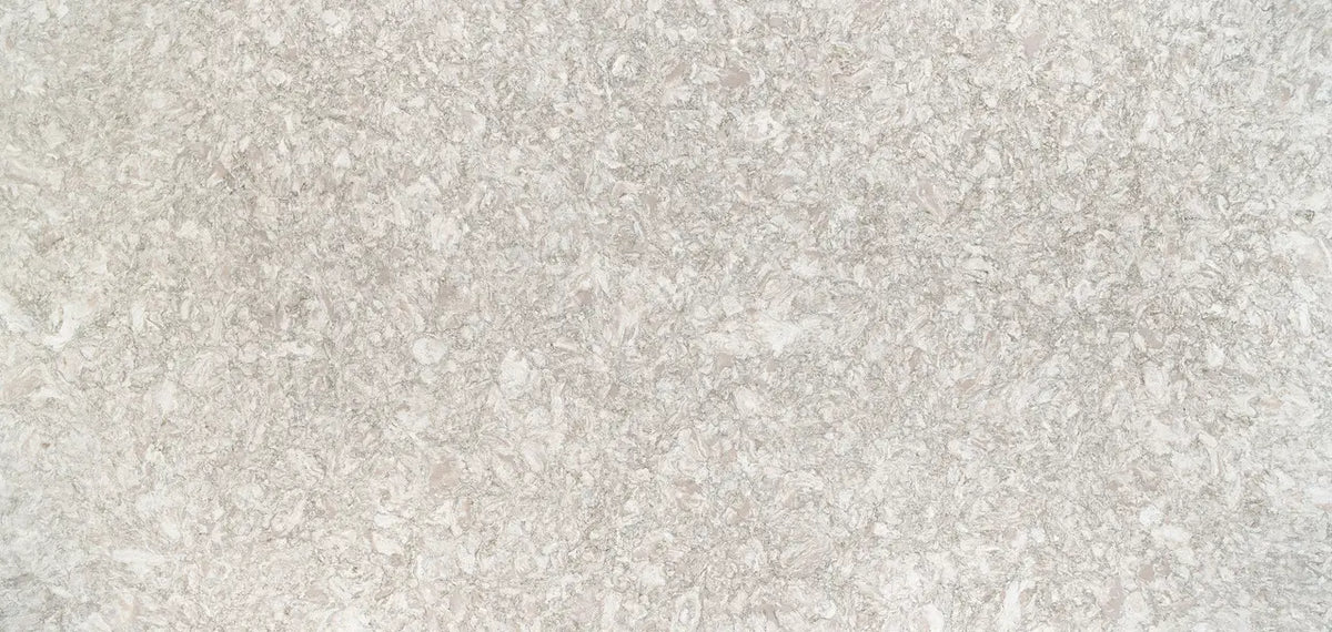 Chatsworth quartz surface with light beige and cream speckled pattern and smooth finish — premium stone countertops installed by Signature Stone Las Vegas