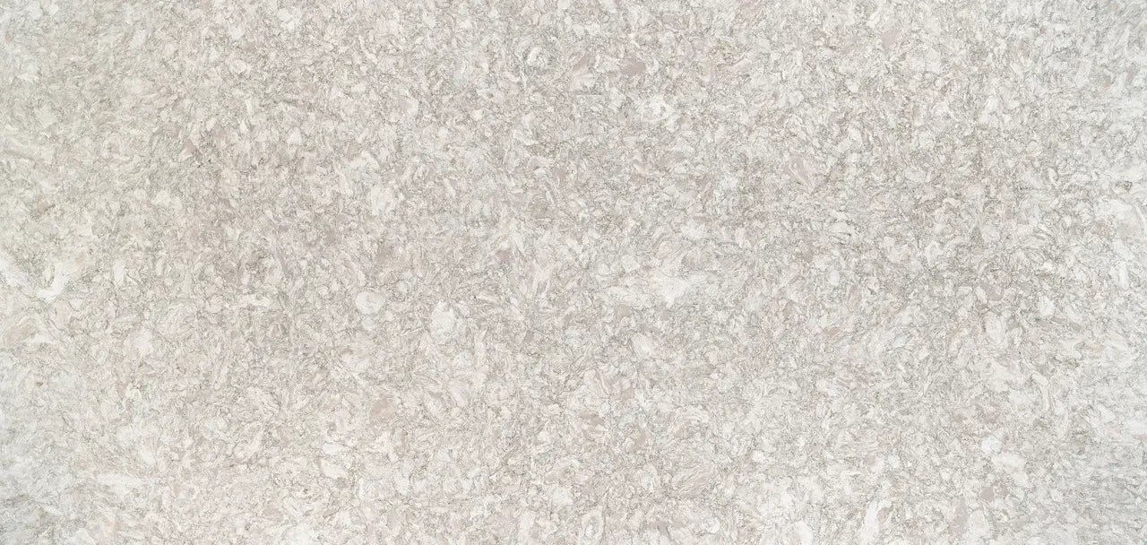 Chatsworth quartz surface with light beige and cream speckled pattern and smooth finish — premium stone countertops installed by Signature Stone Las Vegas
