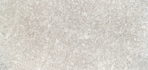 Chatsworth quartz surface with light beige and cream speckled pattern and smooth finish — premium stone countertops installed by Signature Stone Las Vegas