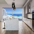 Marble waterfall island with white veining and polished finish in modern kitchen — luxury stone countertops installed by Signature Stone Las Vegas