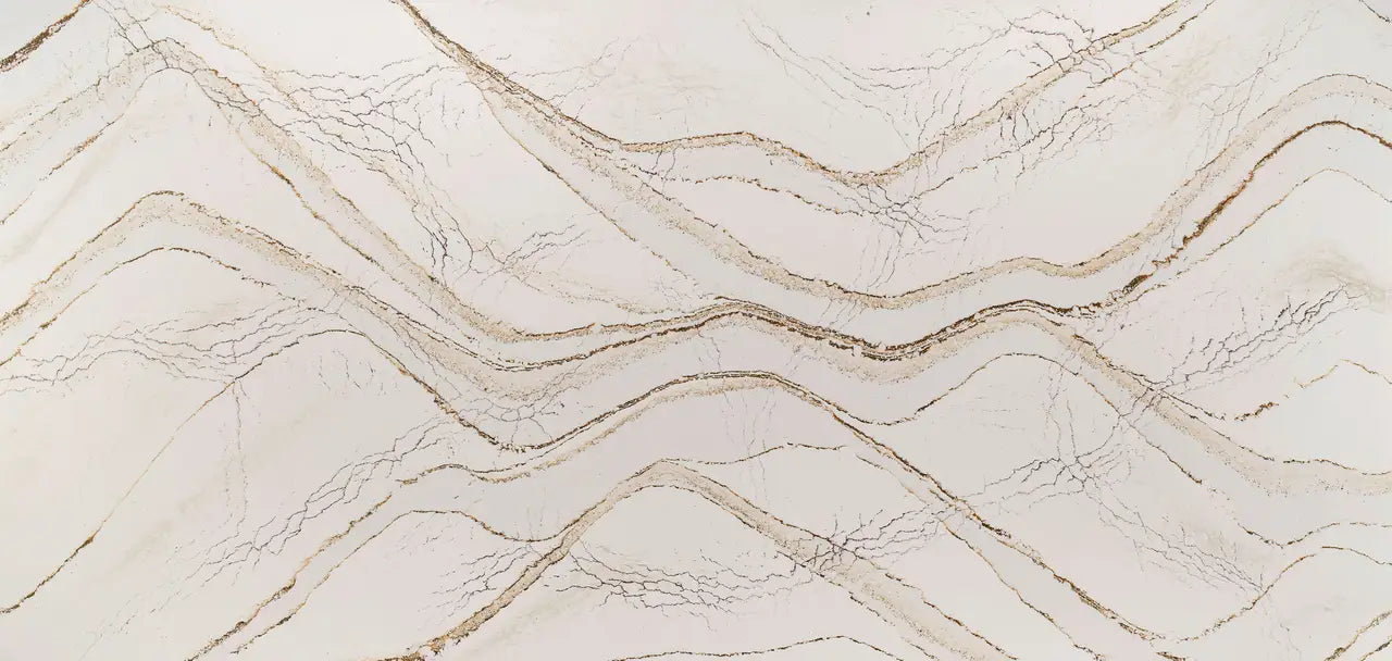 Clovelly quartz slab with flowing cream and beige veining and polished finish — ideal for custom countertops fabricated and installed by Signature Stone LV