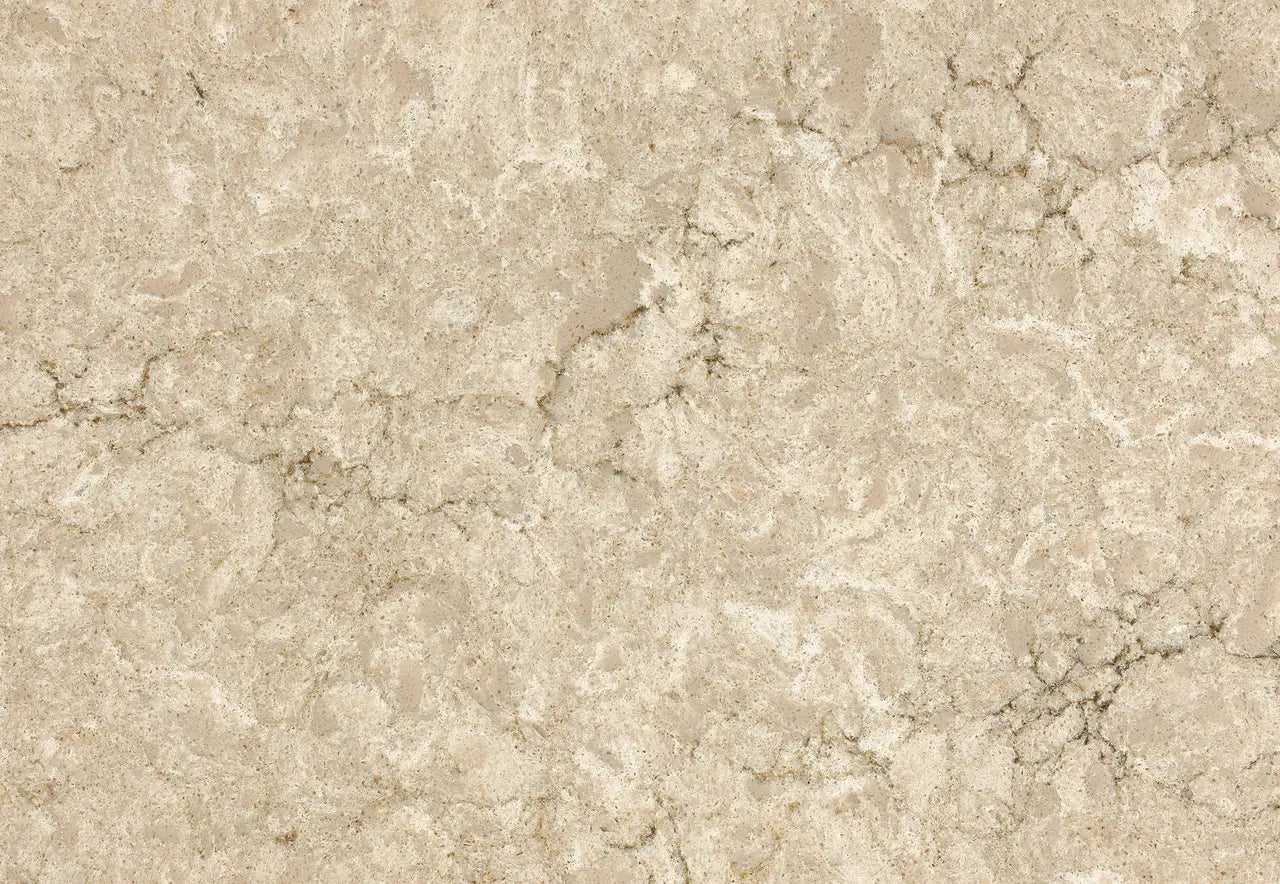 Natural stone slab with warm beige tones and subtle veining throughout the surface — ideal for custom countertops fabricated and installed by Signature Stone LV