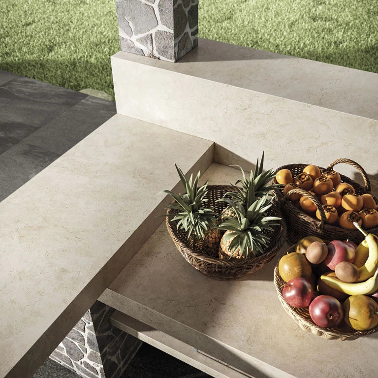 Cream Prestige stone outdoor kitchen surface with warm beige tones and smooth finish — custom countertops fabricated and installed by Signature Stone LV