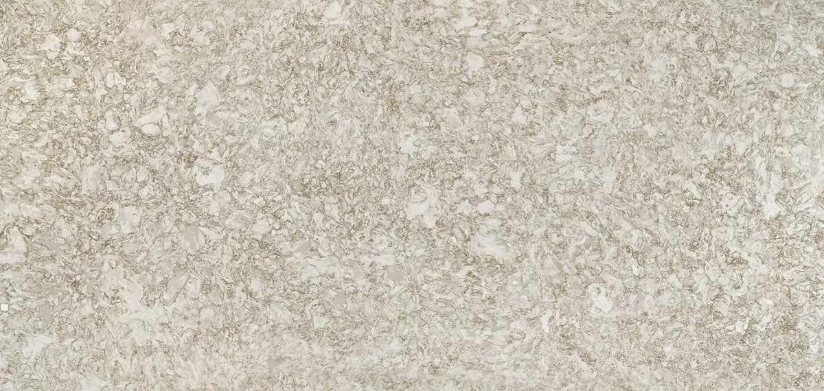Crowndale quartz surface showcasing neutral beige tones with subtle speckled pattern and matte finish — premium countertop fabrication by Signature Stone Las...