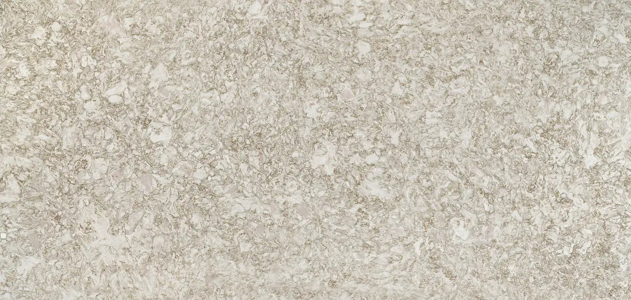 Crowndale quartz surface showcasing neutral beige tones with subtle speckled pattern and matte finish — premium countertop fabrication by Signature Stone Las...
