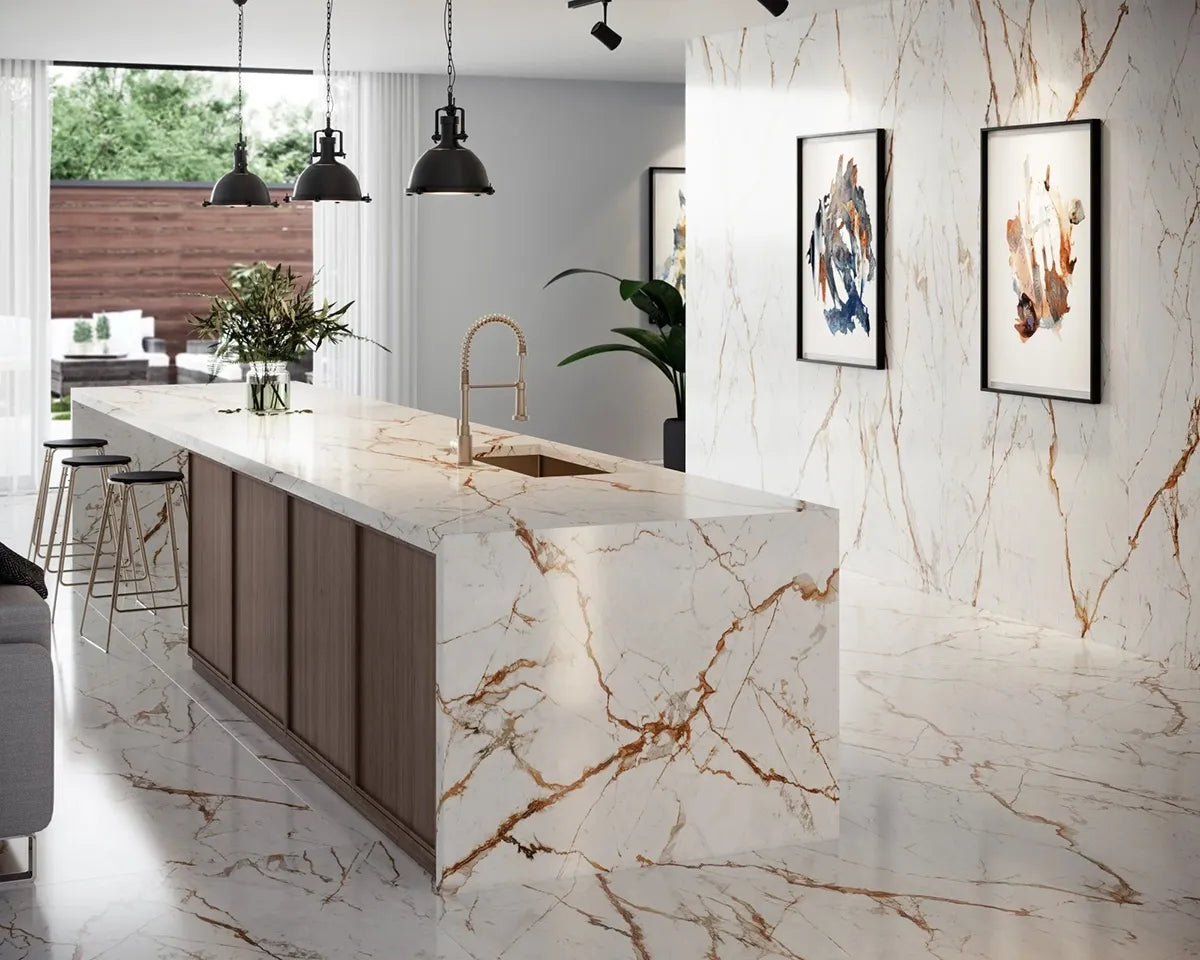 Dekton kitchen island with waterfall edge featuring white marble veining and gold accents — premium dekton countertops installed by Signature Stone Las Vegas