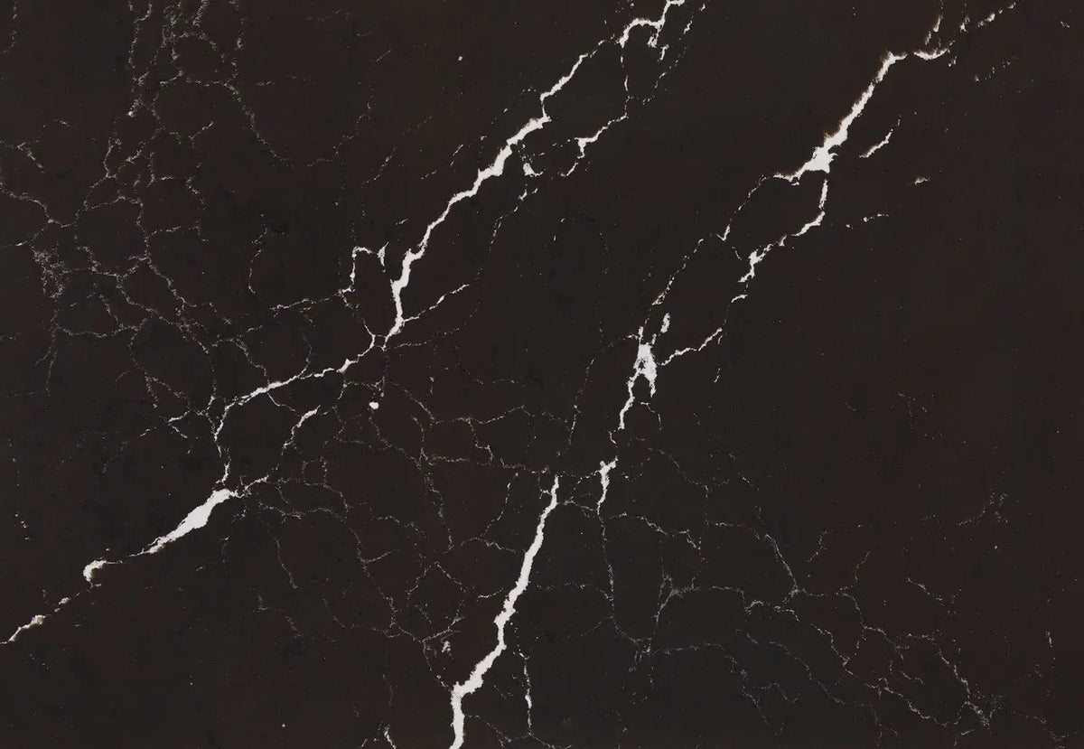 Delamere quartz surface with dramatic black background and bold white veining — custom countertops fabricated and installed by Signature Stone LV