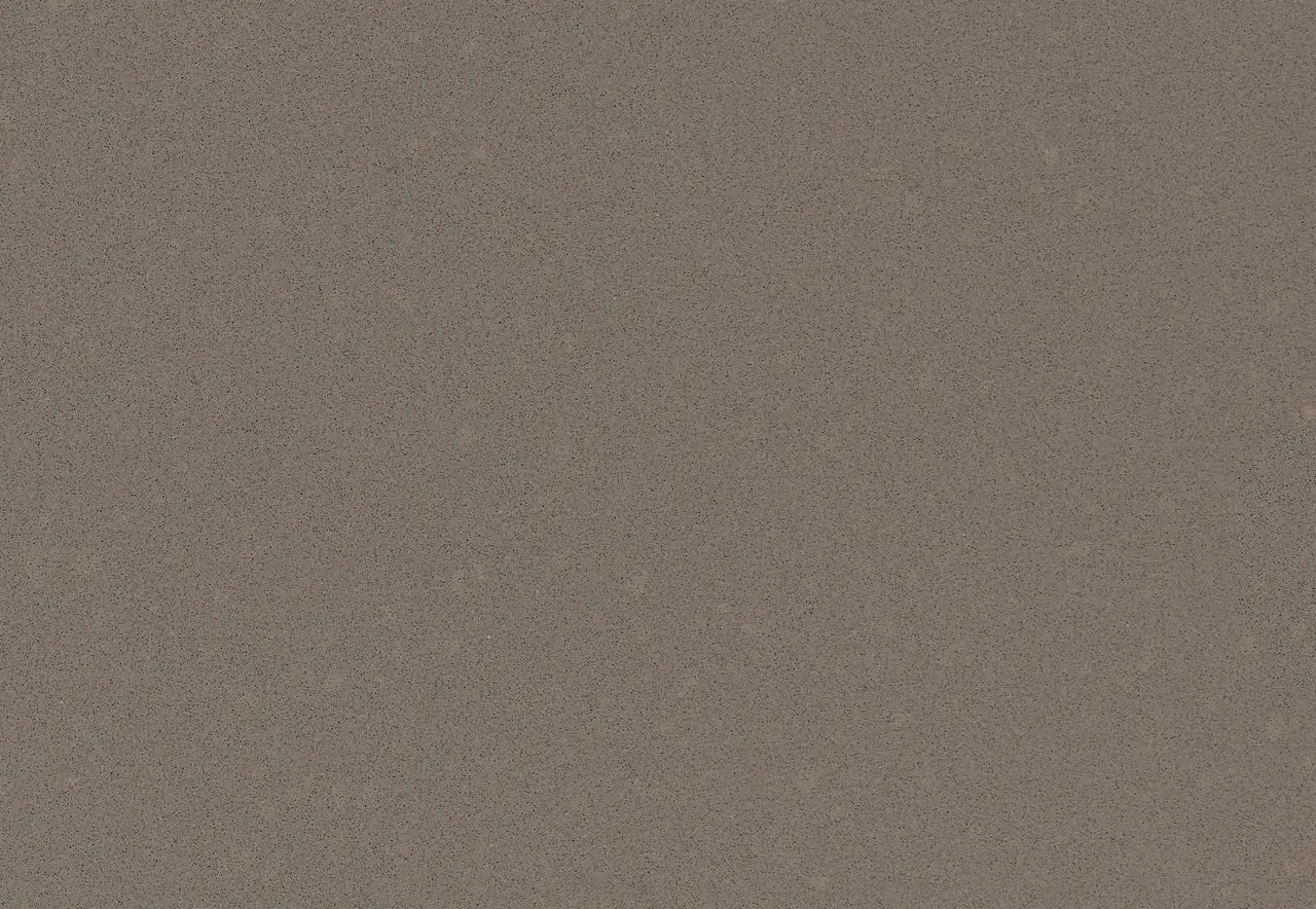Devon quartz surface with warm taupe color and subtle speckled finish — premium stone countertops installed by Signature Stone Las Vegas
