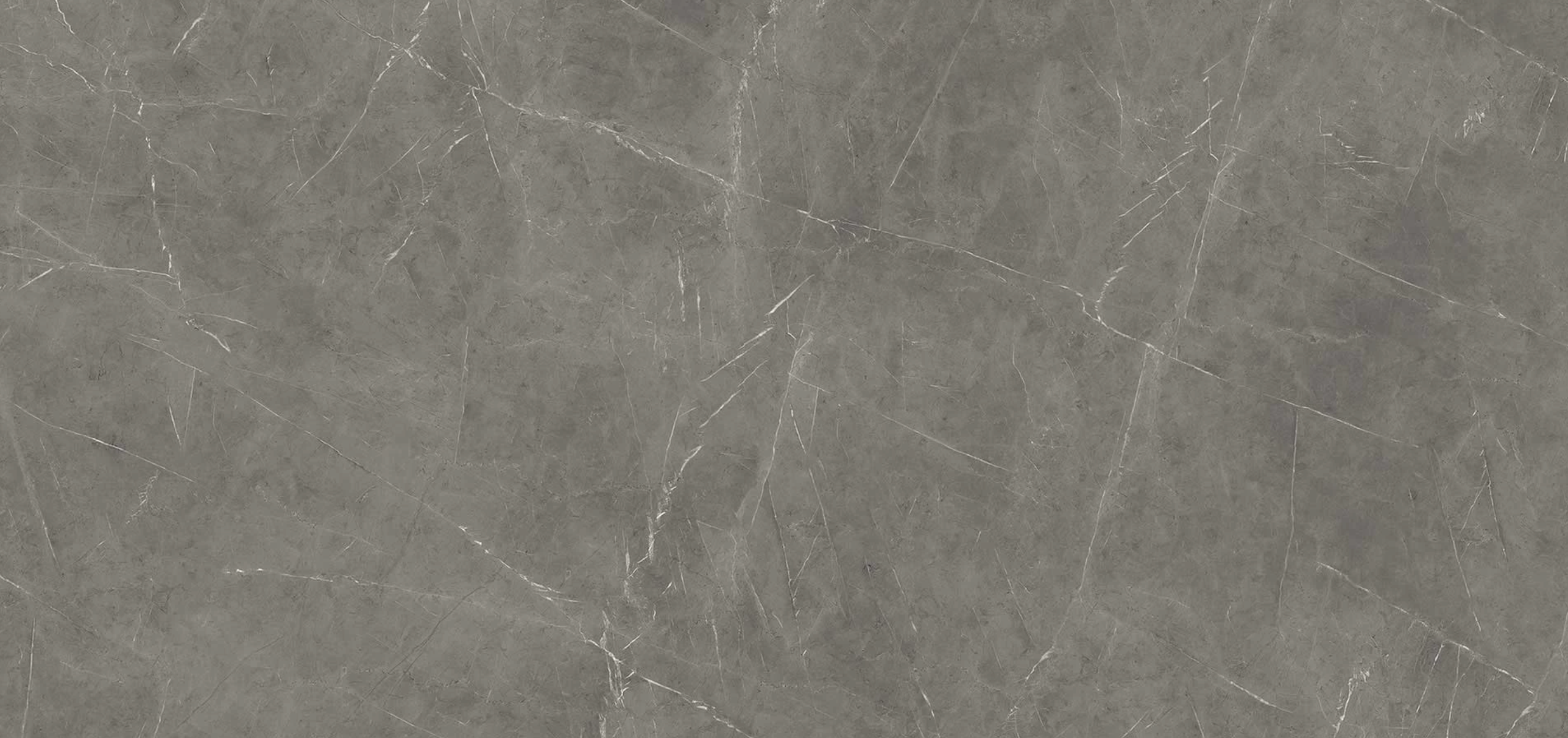 Grey marble surface with elegant white veining and smooth polished finish — custom countertops fabricated and installed by Signature Stone LV