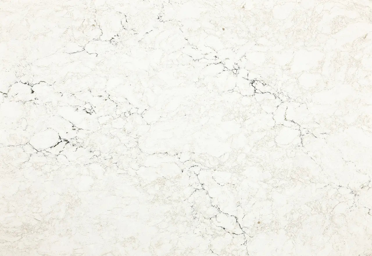 Dovestone quartz slab with cream base and subtle gray veining — elegant custom countertops fabricated and installed by Signature Stone LV