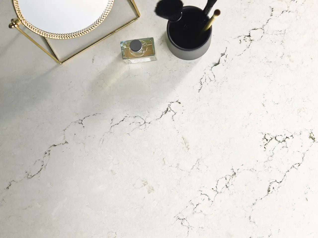 Dovestone quartz countertop with white marble veining and polished finish — premium countertop fabrication by Signature Stone Las Vegas