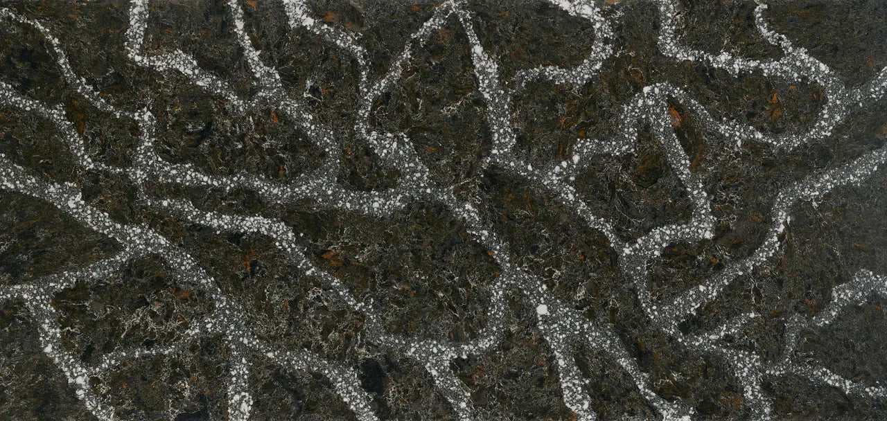 Ellesmere quartz surface with dark charcoal base and intricate white veining patterns — premium countertop fabrication by Signature Stone Las Vegas