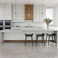 Quartz kitchen island and backsplash with white marble veining and polished finish — elegant stone countertops installed by Signature Stone Las Vegas