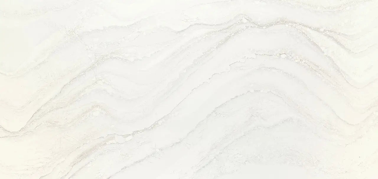 Calacatta marble slab with soft white background and delicate gray veining — custom countertops fabricated and installed by Signature Stone LV