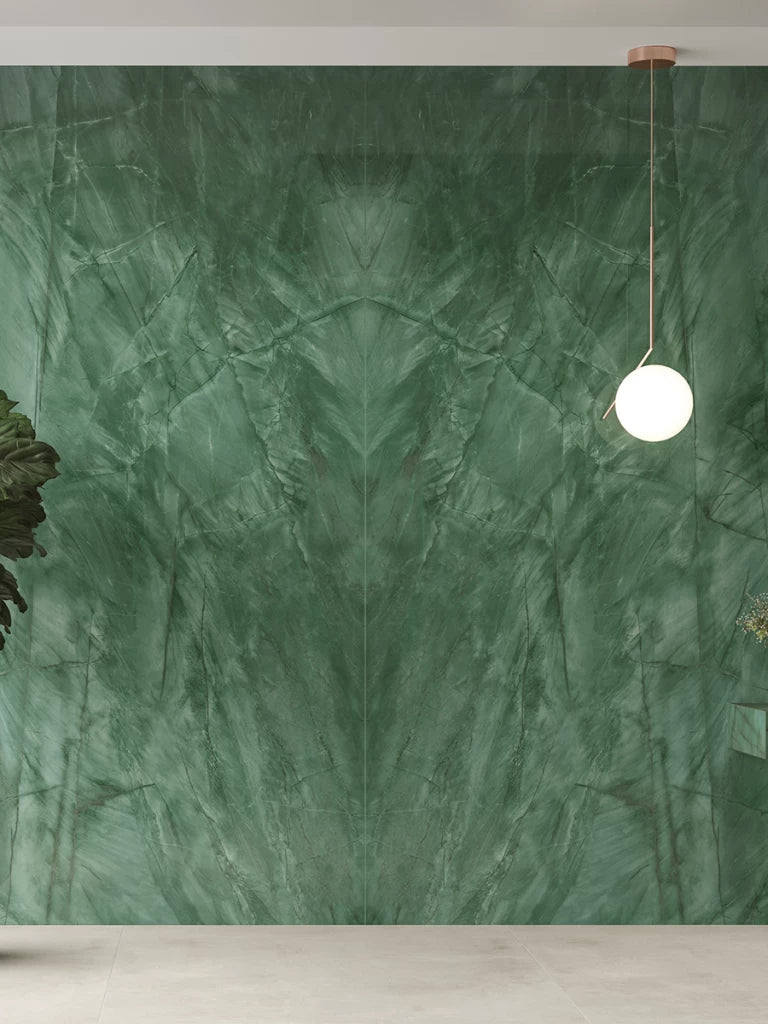 Exotic Green marble wall installation with dramatic veining and book-matched pattern — custom countertops fabricated and installed by Signature Stone LV