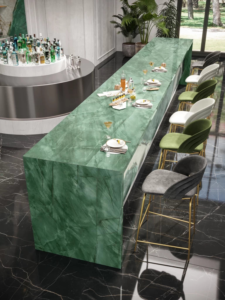 Green marble bar with waterfall edge and veined pattern — luxury stone countertops installed by Signature Stone Las Vegas