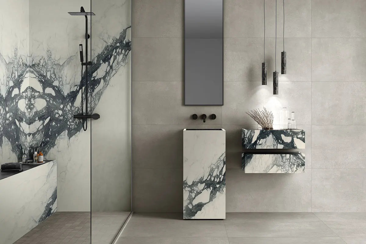 Marble bathroom vanity with dramatic dark veining and sleek modern design — custom countertops fabricated and installed by Signature Stone LV